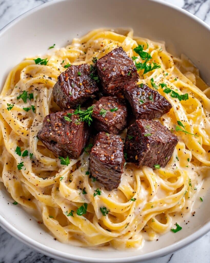 Garlic Butter Steak Bites with Creamy Parmesan Pasta Recipe
