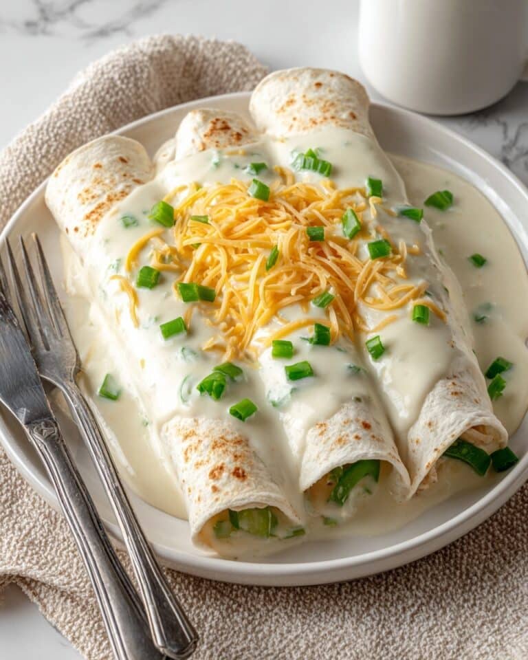 Cheesy Chicken Enchiladas with Creamy Sauce Recipe