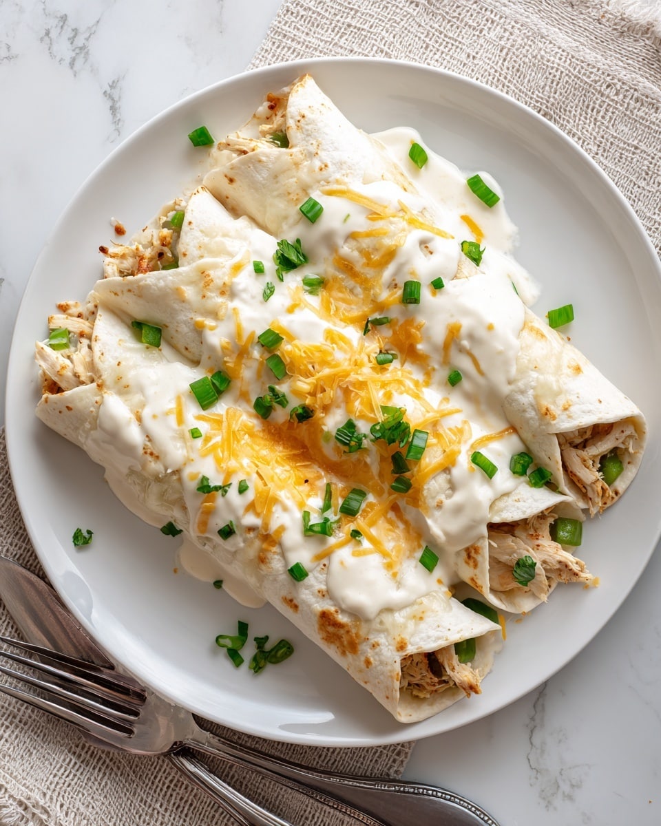 Cheesy Chicken Enchiladas with Creamy Sauce Recipe - Recipe Image